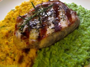 Puree Duo of Pea & Rosemary and Carrot & Parsley Served with Grilled Pork.